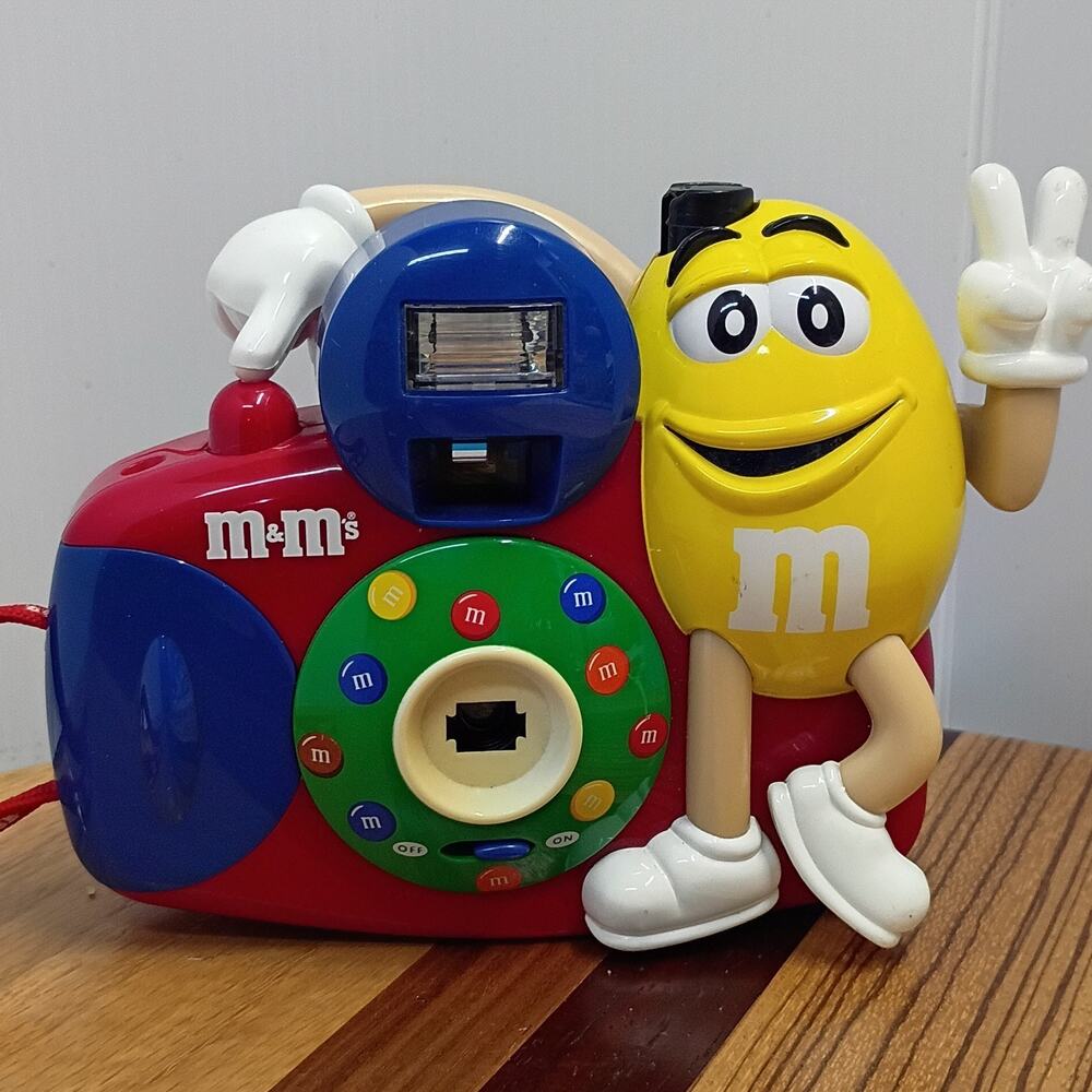 VTG M&M's Yellow Peanut 35mm Film Camera. Polyconcept Flash Photography Works